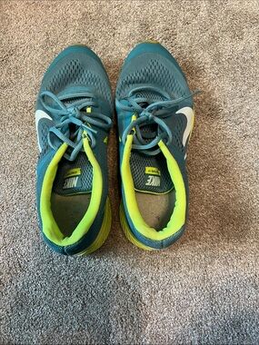 Nike Teal Sneakers with Neon Yellow Accents